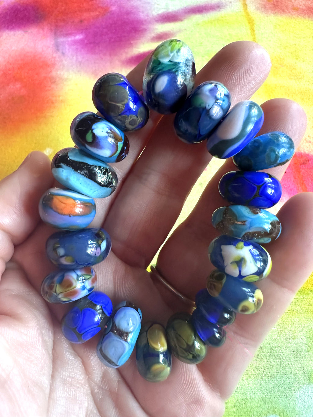 20 piece lampwork glass bead set in royal and indigo blues