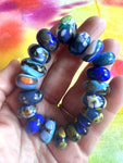 20 piece lampwork glass bead set in royal and indigo blues
