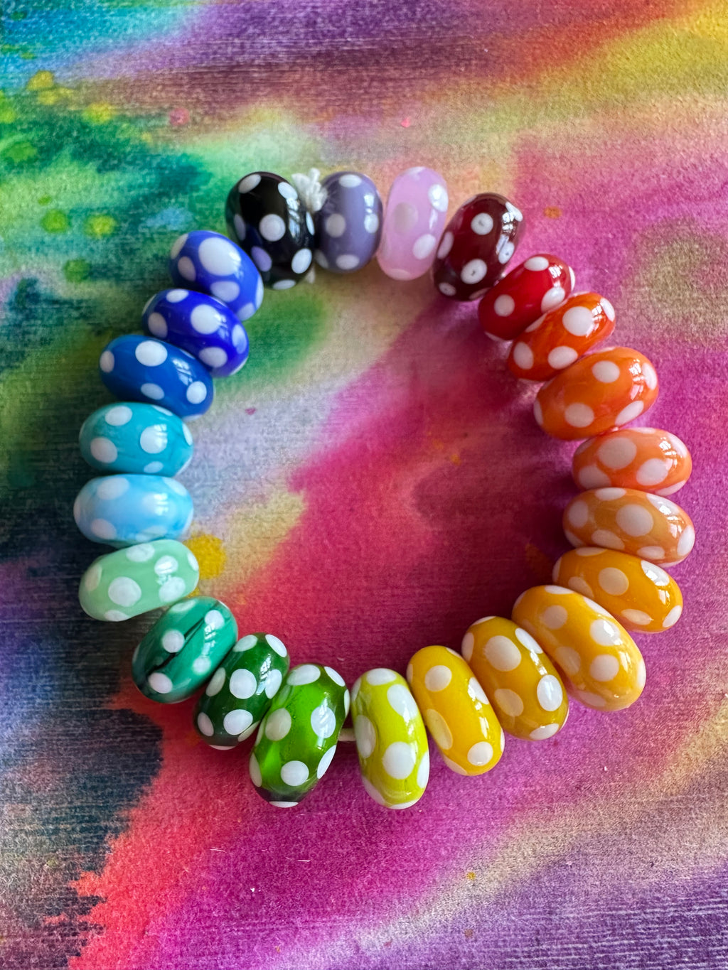Set of 23 polka dots handcrafted glass beads in rainbow colors