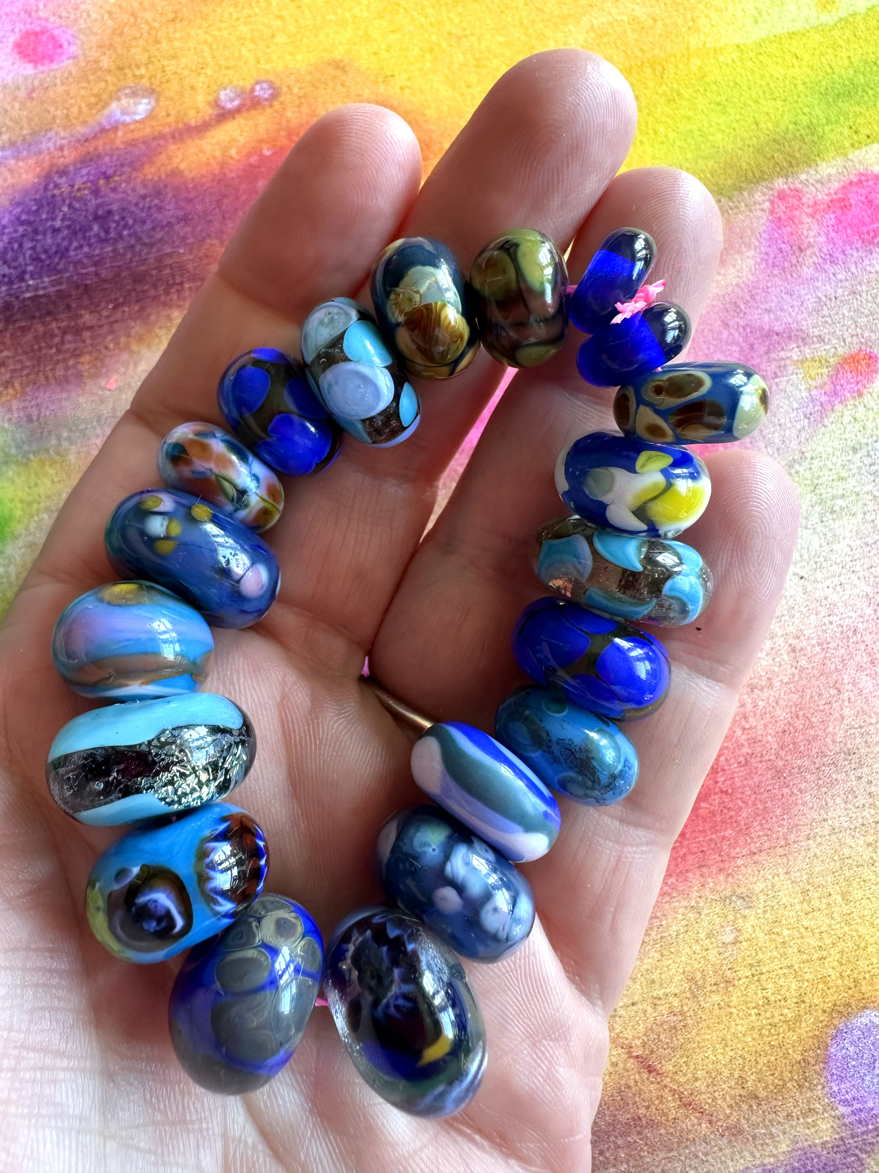 20 piece lampwork glass bead set in royal and indigo blues