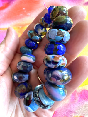 20 piece lampwork glass bead set in royal and indigo blues