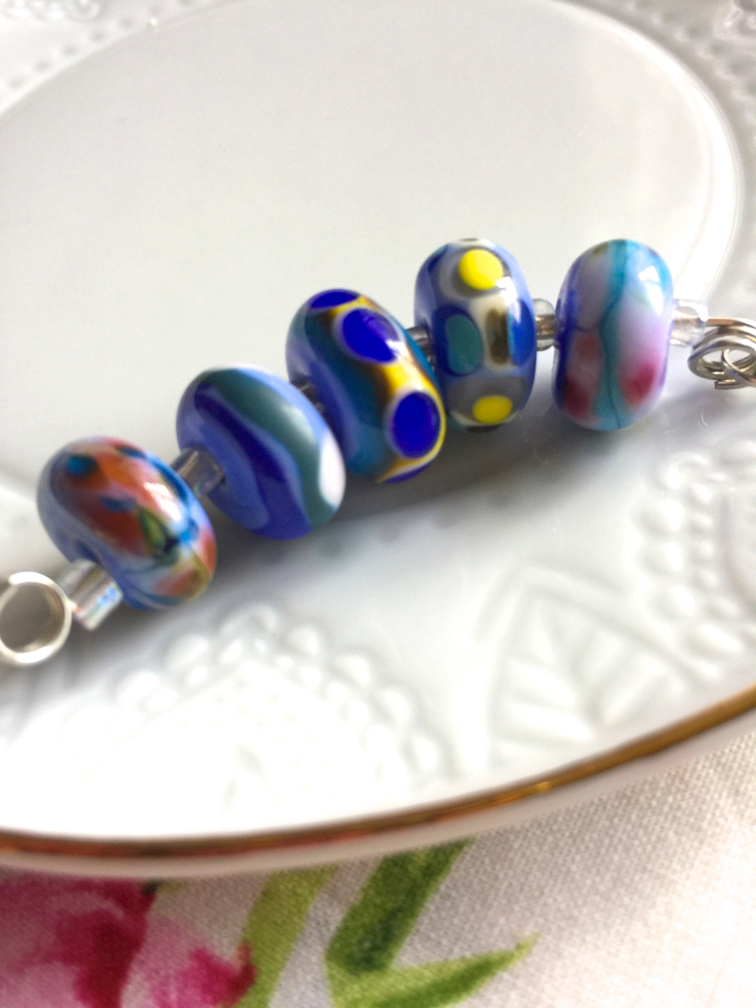 Set of 5 Handcrafted Lampwork Glass Beads in shades of Blues.