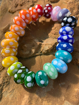 Set of 23 polka dots handcrafted glass beads in rainbow colors