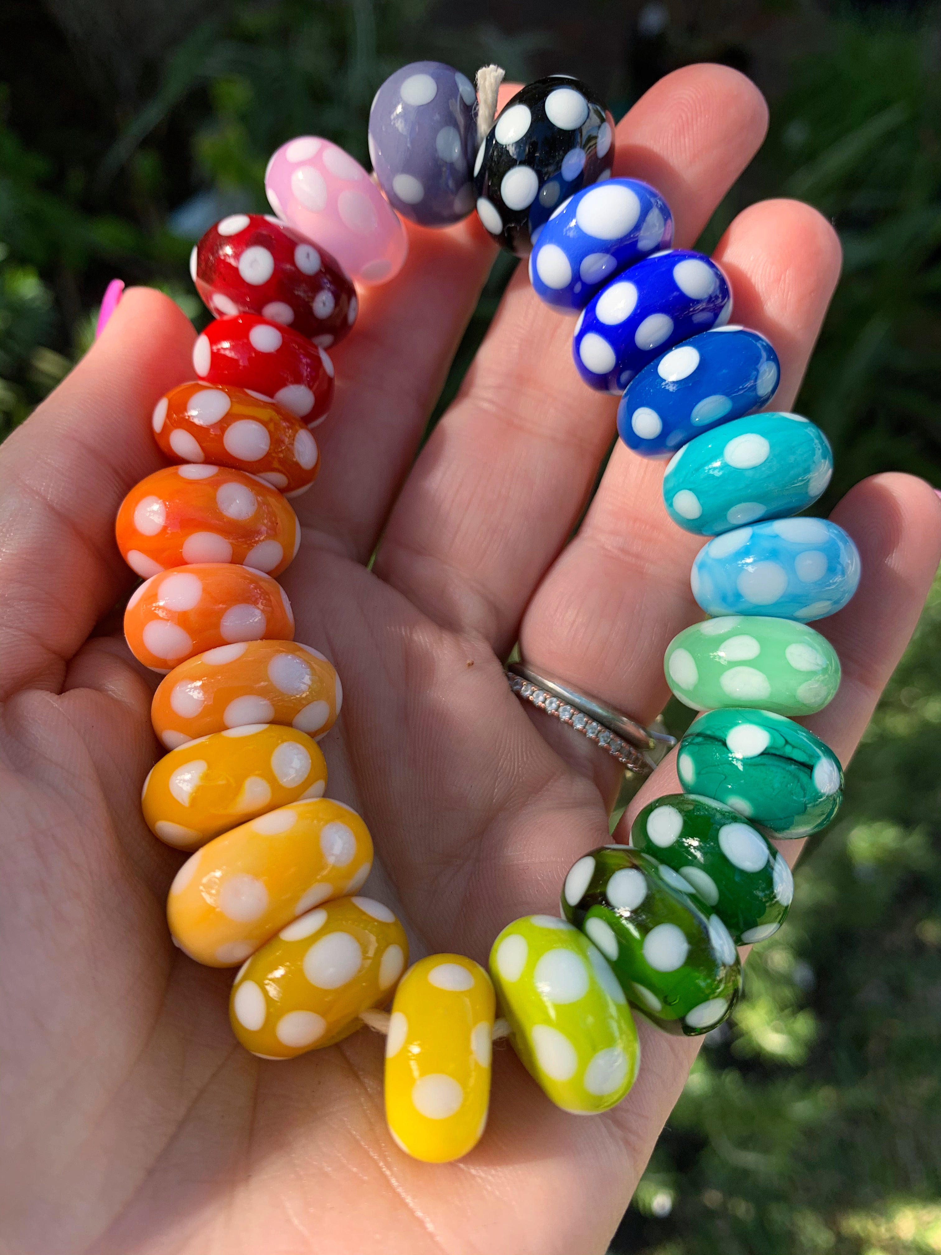 Set of 23 polka dots handcrafted glass beads in rainbow colors