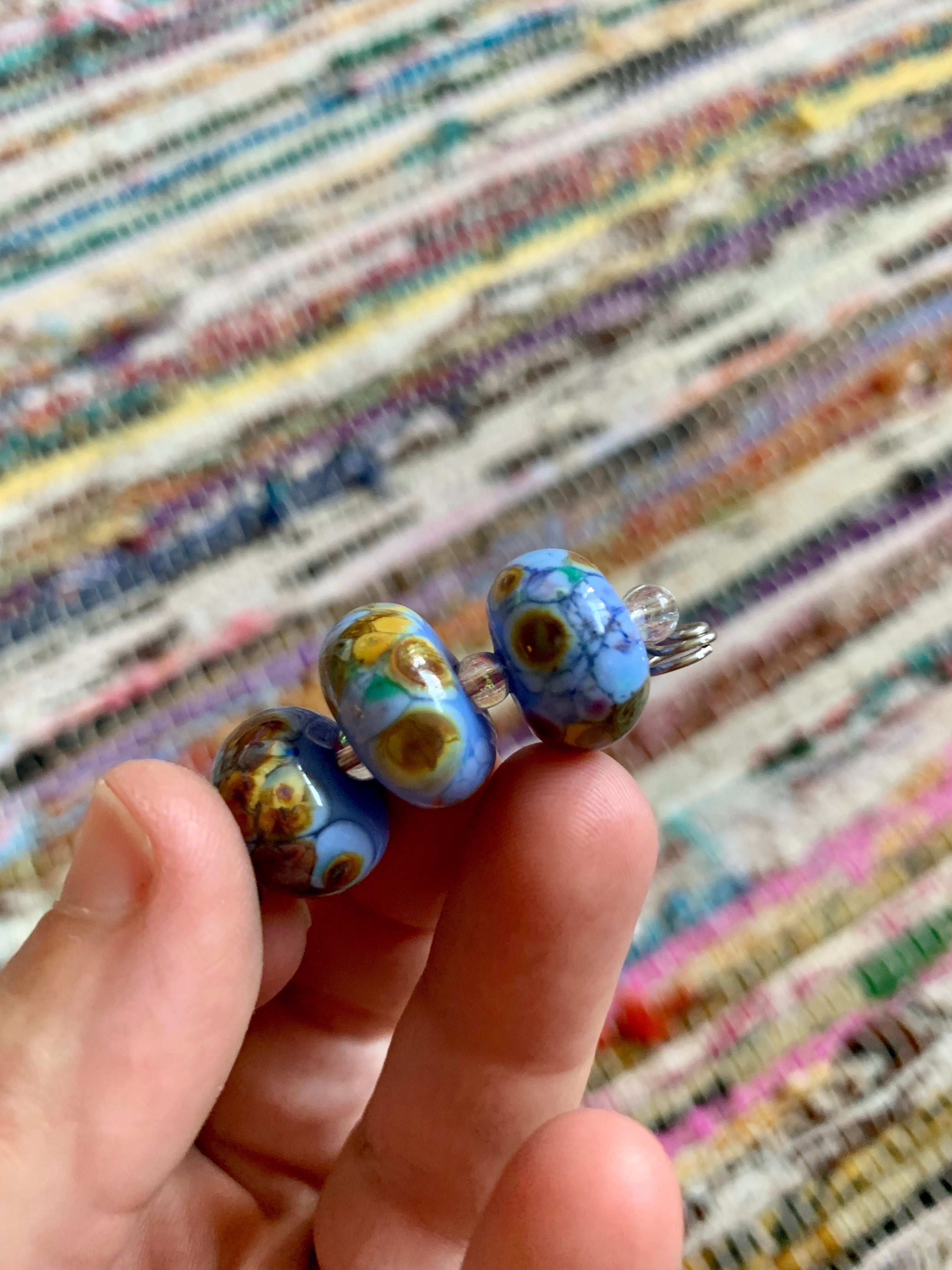 Set of 3 stunning periwinkle lampwork glass beads with multicolor speckling