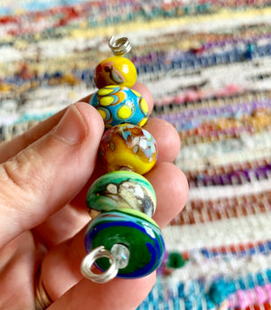 Set of 5 summery lampwork glass beads in yellows, teal, blues, and greens